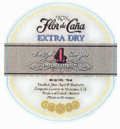 RON Flor de Caña EXTRA DRY Slow Aged 4 Four Years IMPORTED RUM 40 ALC/VOL- 750 ml Distilled.Slow Aged & Bottled by Compañia Licorera de Nicaragua.S.A. Product of Central America Made in Nicaragua