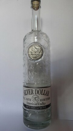 NEVADA H&C DISTILLING CO. LAS VEGAS NEVADA E PLURIBUS UNUM 1878 SILVER DOLLAR AMERICAN VODKA HC SMALL BATCH SILVER FILTERED NEVADA H&C DISTILLING CO. LAS VEGAS NEVADA COPPER POT DISTILLED IN LAS VEGAS NEVADA